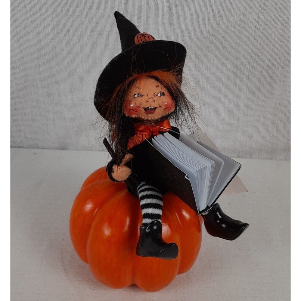 Anna Lee 6" Witch Kid with Spell Book on Pumpkin Decorative Collectible #201007